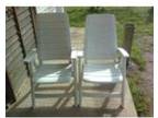matching chairs and loungers. a pair of solid white....